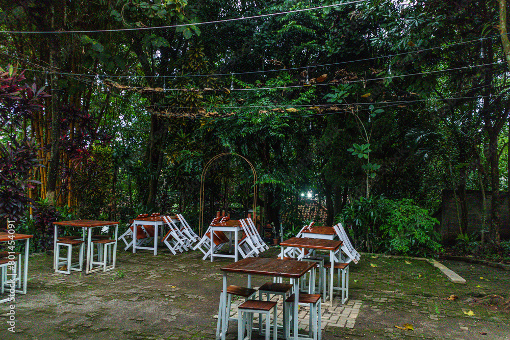 Decorative table and chairs in empty outdoor cafe Decorative table and chairs in empty outdoor cafe
