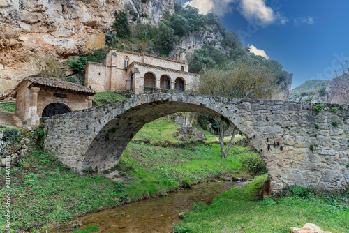 Hermitage of Santa María de la Hoz in the small village of La Tobera, built on a hill in front of a Roman stone bridge belonging to the municipality of Frías.