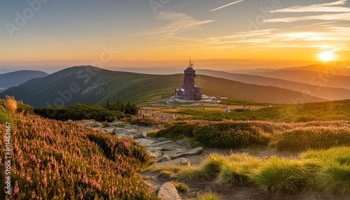 summer view with heathers in the karkonosze mountains during sunrise photo