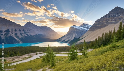 bow lake alberta canada mountain landscape at dawn sunbeams in a valley photo
