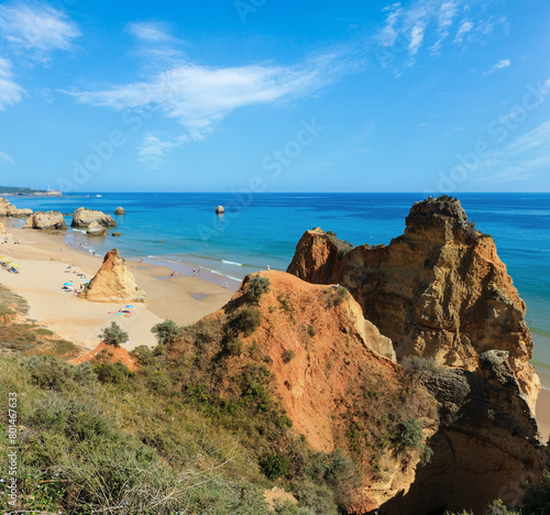 Schilderij op canvas Evening sandy beach Praia dos Tres Castelos with rock formations, Portimao, Algarve, Portugal