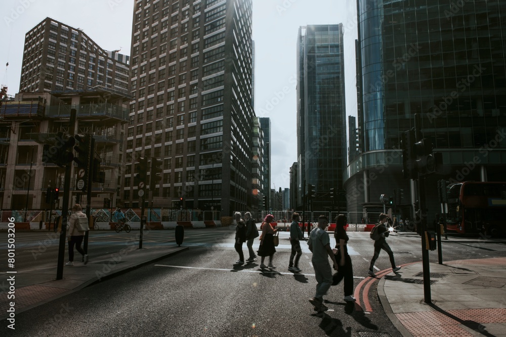 People crossing road, Canary Wharf photo