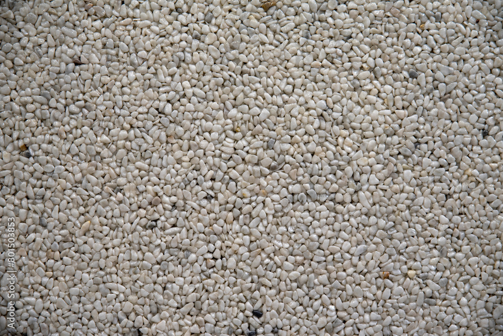 Small white natural crushed marble chips, close-up Small white natural crushed marble chips, close-up