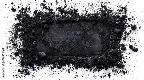   A mound of dirt on a pristine white background, featuring a central black square embedded within it