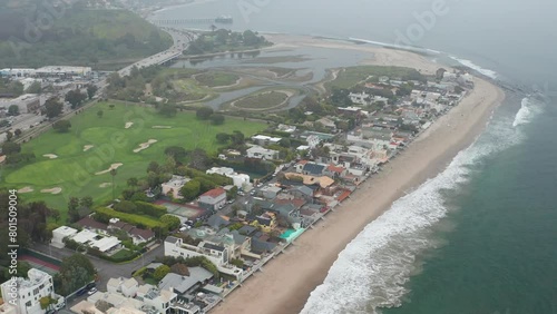 Malibu California a city town in Los Angeles with beach, waves, homes, coastline