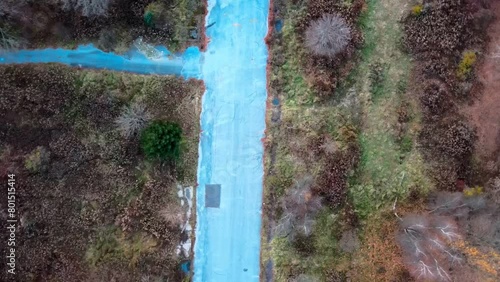 Aerial top down of graffiti road in Fall around abandoned coal town Centralia Pennsylvania photo