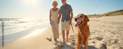 Mature couple walking dog on sunny beach