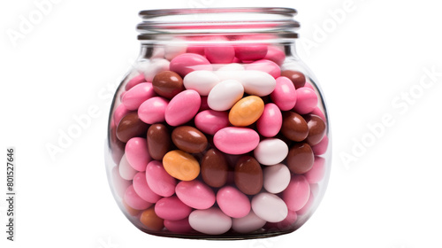 A glass jar overflows with a colorful assortment of candies, creating a vibrant and tempting display