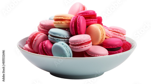 A white bowl filled with pink and blue macaroons  creating a colorful and delicious display