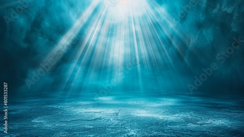  An underwater scene with bright beams of light penetrating from the water's surface and bottom