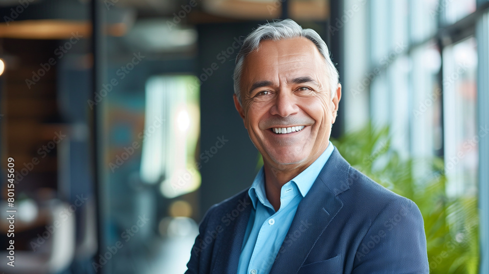 Smiling older bank manager or investor, happy middle aged business man boss ceo, confident mid adult professional businessman executive standing in office, mature entrepreneur headshot portrait
