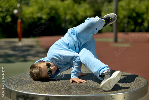 Little boy in breakdancing position. Breakdance boy, breakdance kid