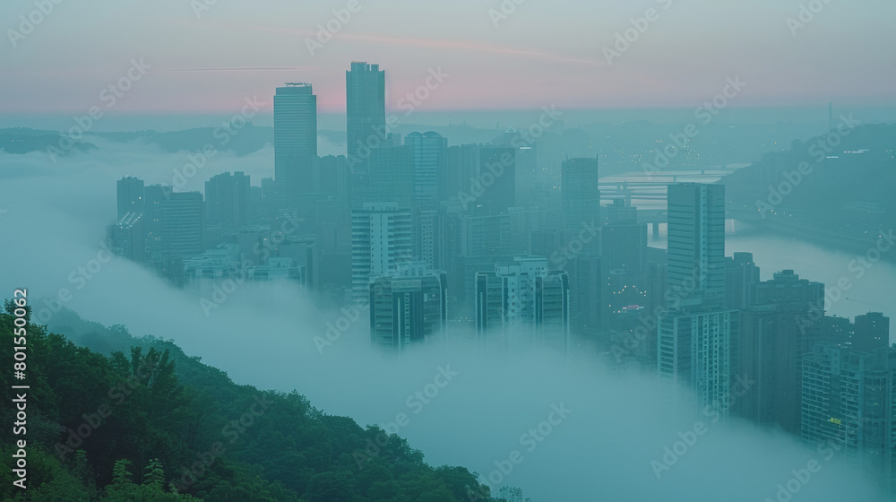 Foggy city with tall buildings and a river. The city is covered in a thick layer of fog, giving it a mysterious and eerie atmosphere. The tall buildings seem to be reaching for the sky