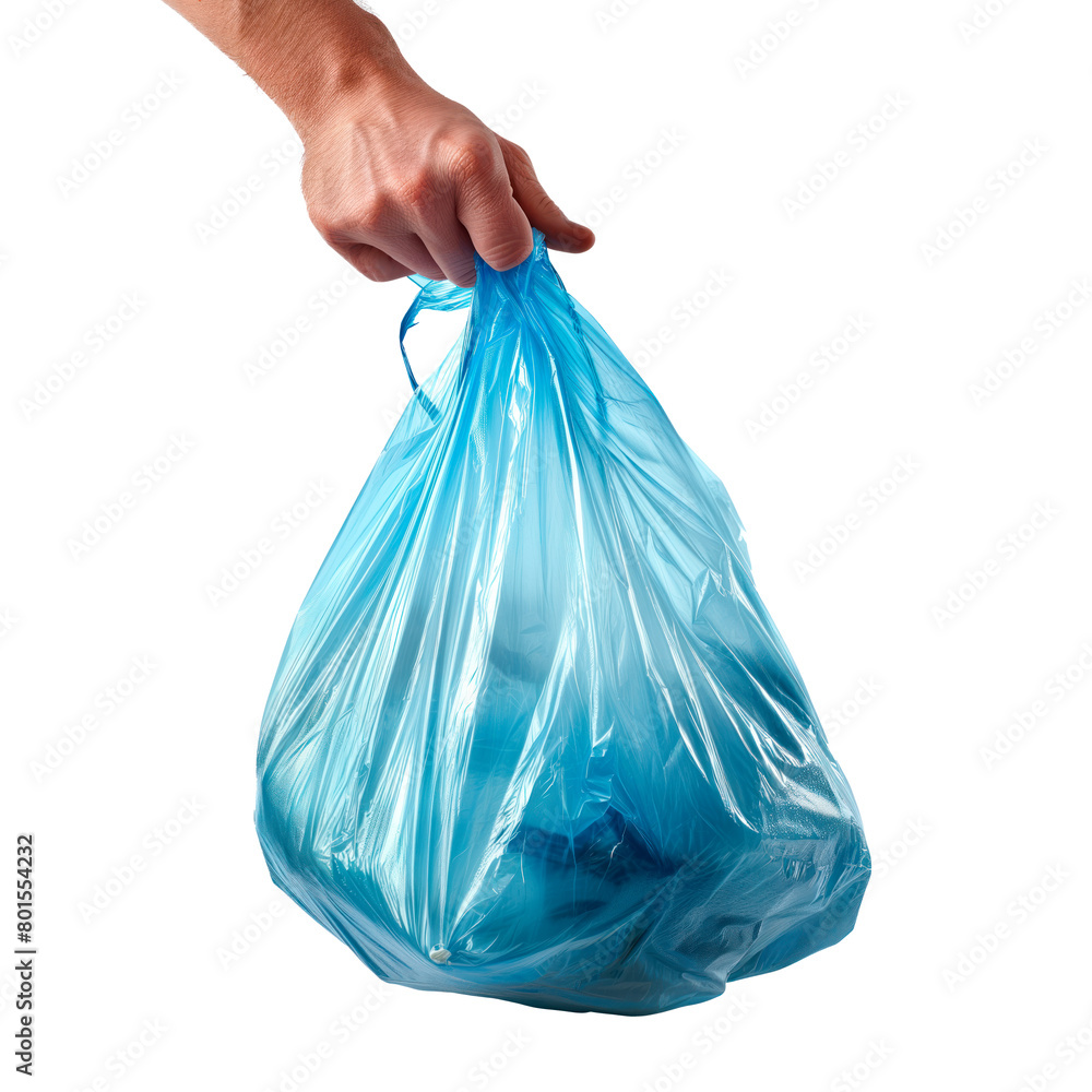 Fototapeta premium A blue garbage bag in a hand, isolated against a white or transparent background. Close-up of the blue garbage bag in a hand. Sorting garbage into the correct containers. Graphic design element.
