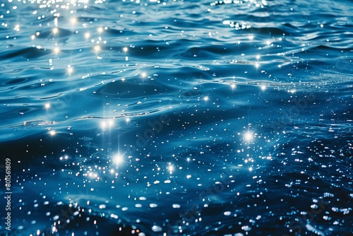 Sparkling Blue Waters Under Sunlight With Glittering Highlights