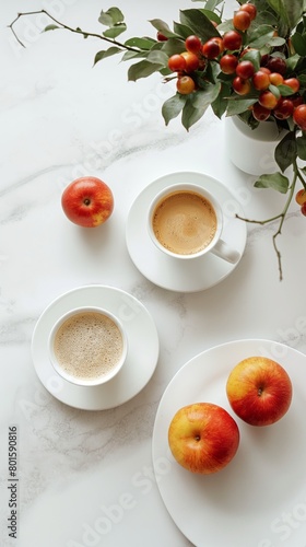 A minimalist still life featuring a cup of coffee surrounded by fresh fruit