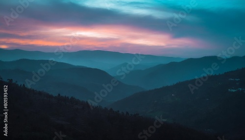 amazing landscape in the layers of mountains at the dusk view of colorful sky and hills covered by forest