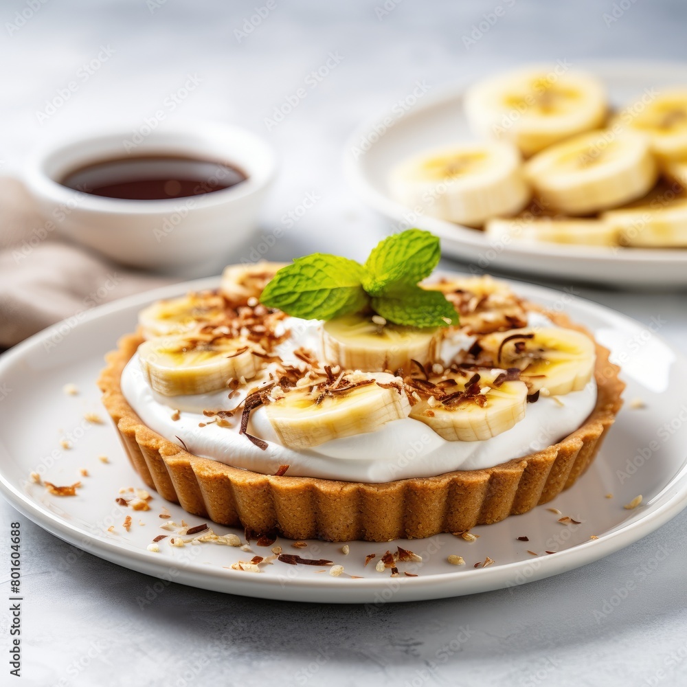 Banoffee Tart on marble background, close up Banoffee Tart on marble background, close up