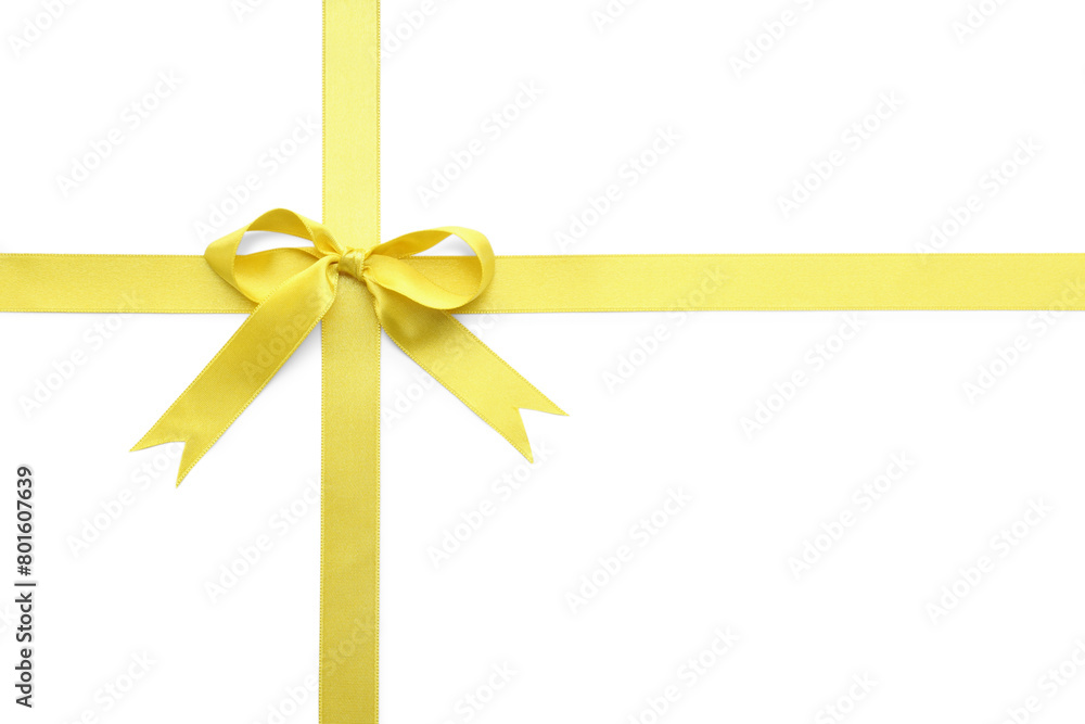Yellow satin ribbon with bow on white background, top view Yellow satin ribbon with bow on white background, top view