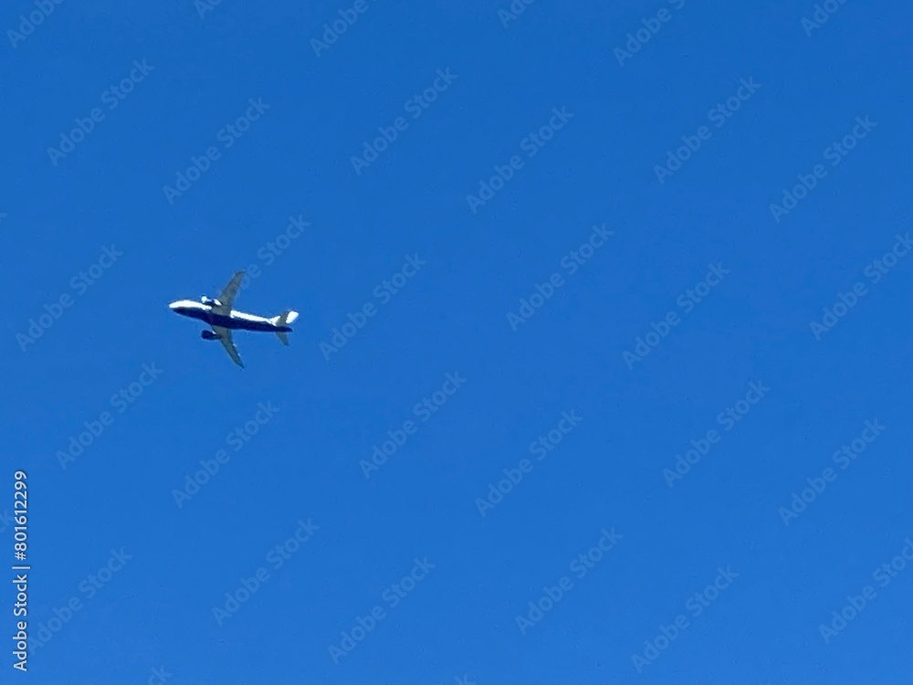 An Airplane is Approaching High Altitude. It Took off from Chania Creta Airport and Passing over the Chania City of Greece GR. The Footage was Captured on 03-August-2023. An Airplane is Approaching High Altitude. It Took off from Chania Creta Airport and Passing over the Chania City of Greece GR. The Footage was Captured on 03-August-2023.