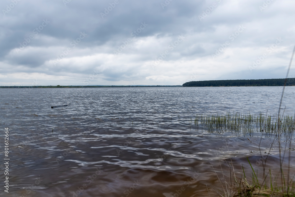 waves on the surface of the river in cloudy spring weather waves on the surface of the river in cloudy spring weather
