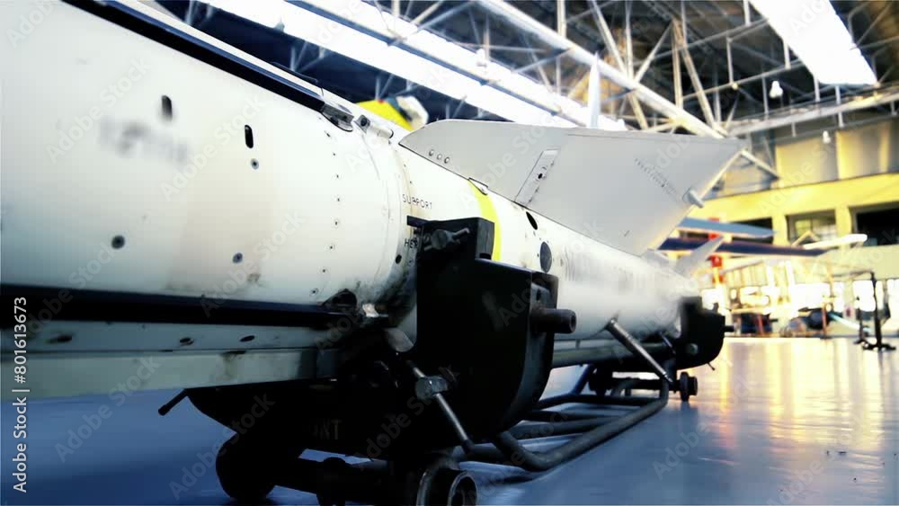 Medium to Short Range Air-to-air Missile on Display in A Hangar. Close Up. 4K Resolution. Medium to Short Range Air-to-air Missile on Display in A Hangar. Close Up. 4K Resolution.