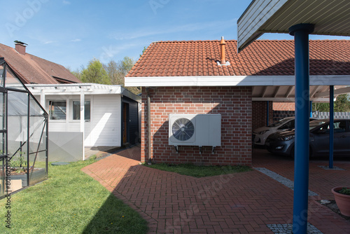 Air Source heat pump fitted outside a new home development