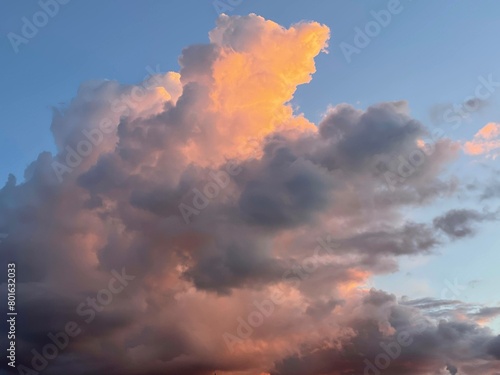 Dramatic orange grey purple sky and cloudy at sunset for background. High quality photo