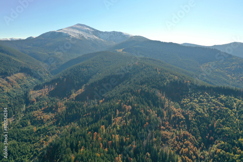 Fototapeta Naklejka Na Ścianę i Meble -  Beautiful mountains covered with forest on sunny day. Drone photography