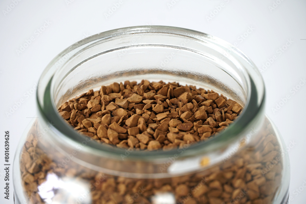 Close up view of freeze dried instant coffee in a glass jar Close up view of freeze dried instant coffee in a glass jar