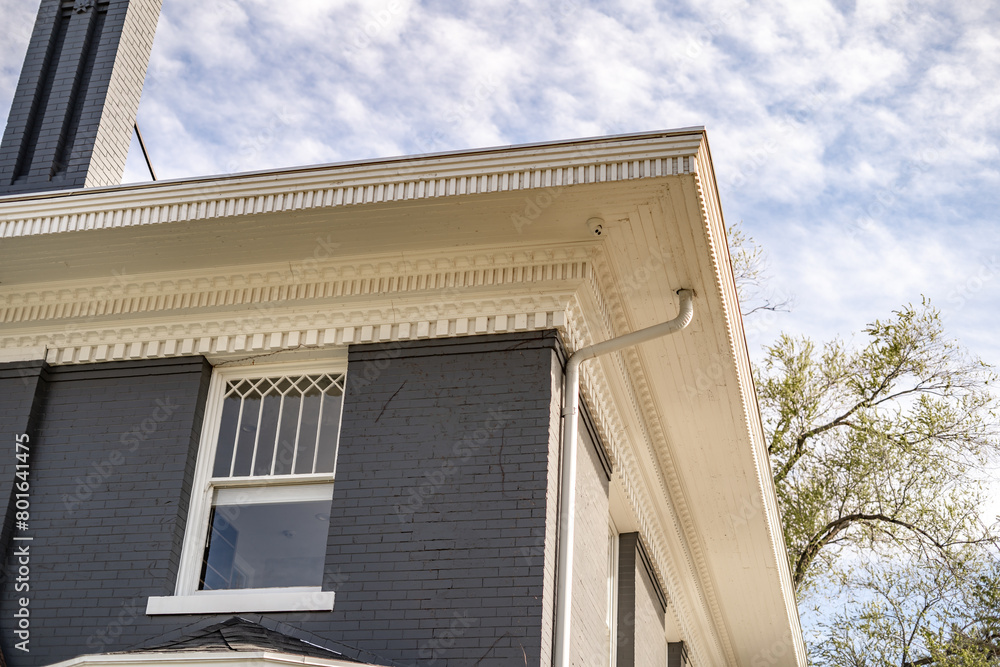 Cute Blue Brick Home White Trim Roof