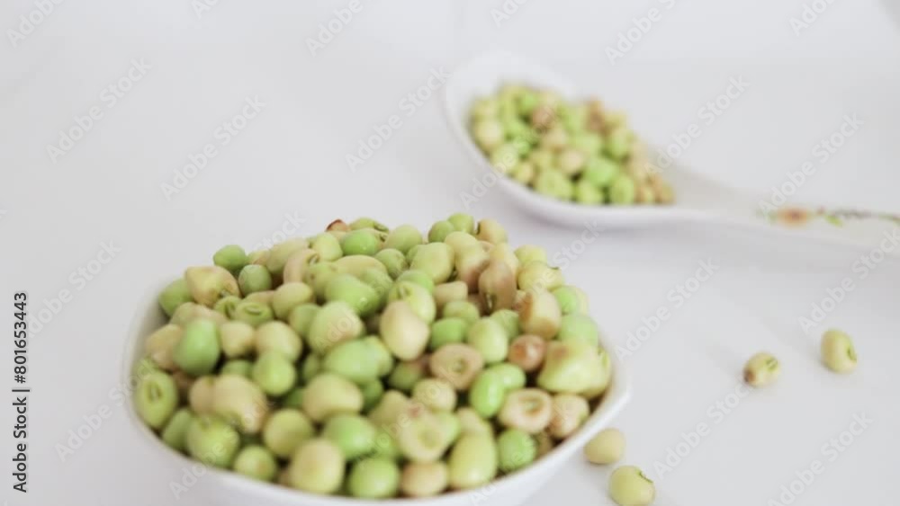 Fresh Green black eyed peas beans lili chori in a white bowl on white background Fresh Green black eyed peas beans lili chori in a white bowl on white background