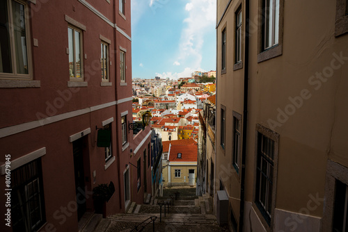 The city of Lisbon in between a little corridor (ID: 801679845)