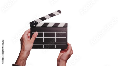Hands holding a clapper board