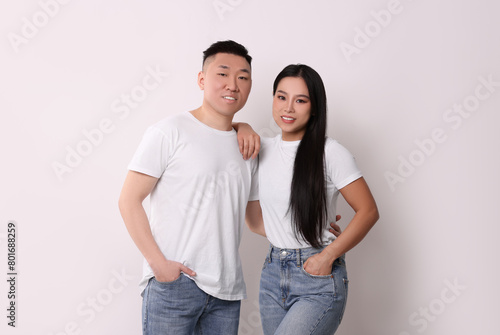 Portrait of happy couple on white background