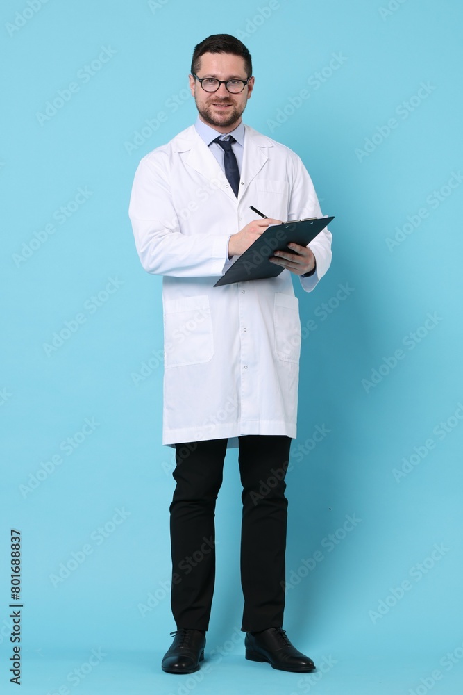 Doctor with pen and clipboard on light blue background Doctor with pen and clipboard on light blue background