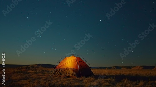 Field of Dreams: A Tranquil Night Scene with a Small Tent Set Up in the Open.