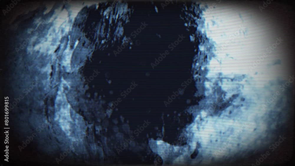 Television screen with textured grunge images in fast loop motion