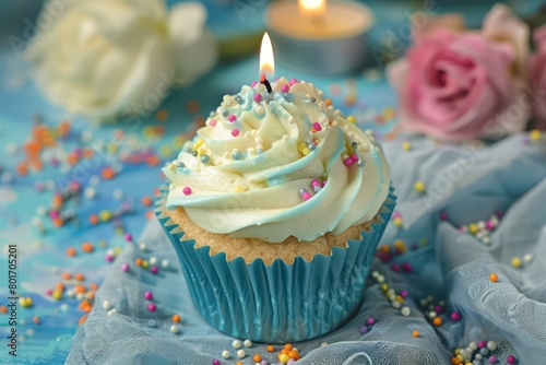 cupcake with candle and sprinkles