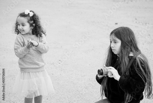 Wallpaper Mural Two girls outdoors in black and white Torontodigital.ca
