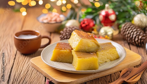 Christmas dinner philipines, bibingka is a doughy rice-flour cake incorporating coconut milk, butter and eggs photo