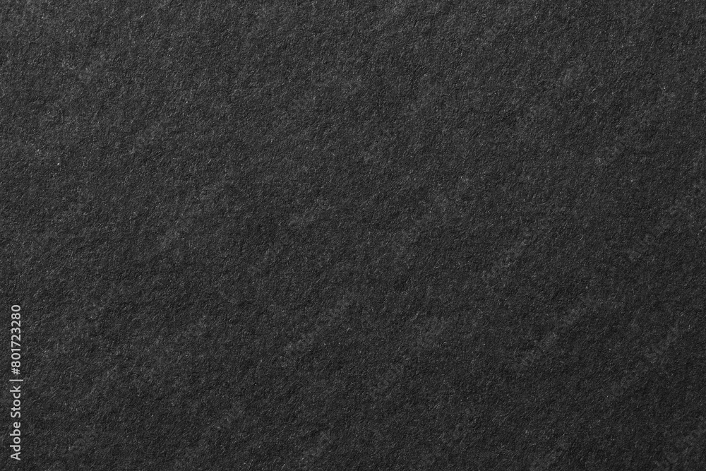 Black background, rough paper texture Black background, rough paper texture