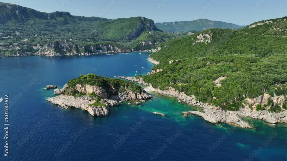 Limni beach glyko on corfu island, sunlit coast with clear turquoise ionic sea waters, aerial view Limni beach glyko on corfu island, sunlit coast with clear turquoise ionic sea waters, aerial view