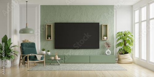 Pastel TV room with green armchair and decoration accessory- 3D rendering