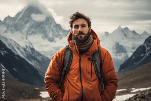 A Serene Portrait of an Adventurous Soul Standing Proudly Before the Majestic Snow-Capped Peaks of the Great Mountain Range