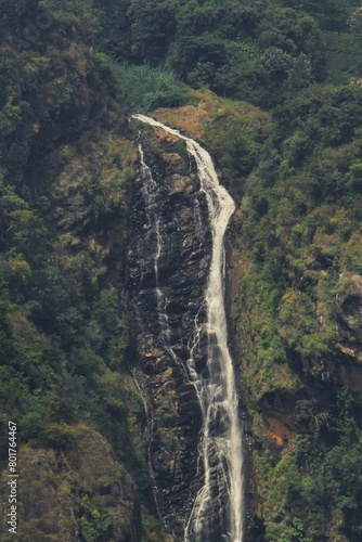 lush green nilgiri mountains and beautiful catherine waterfall from dolphin nose view point of coonoor near ooty hill station in tamilnadu, india