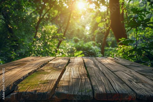 A wooden table with a view of a forest