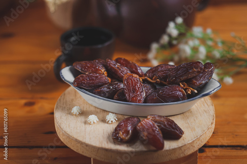 Dates and pure drinking water is consume to end Ramadan fast. Breaking Ramadan fast at Iftar. photo