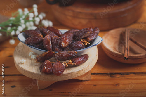 Dates and pure drinking water is consume to end Ramadan fast. Breaking Ramadan fast at Iftar. photo