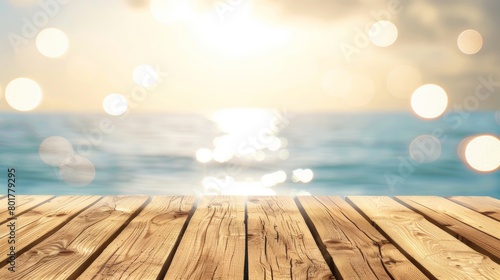 Sunrise or sunset view over the ocean, looking from a wooden pier deck with sparkling water bokeh in the foreground.